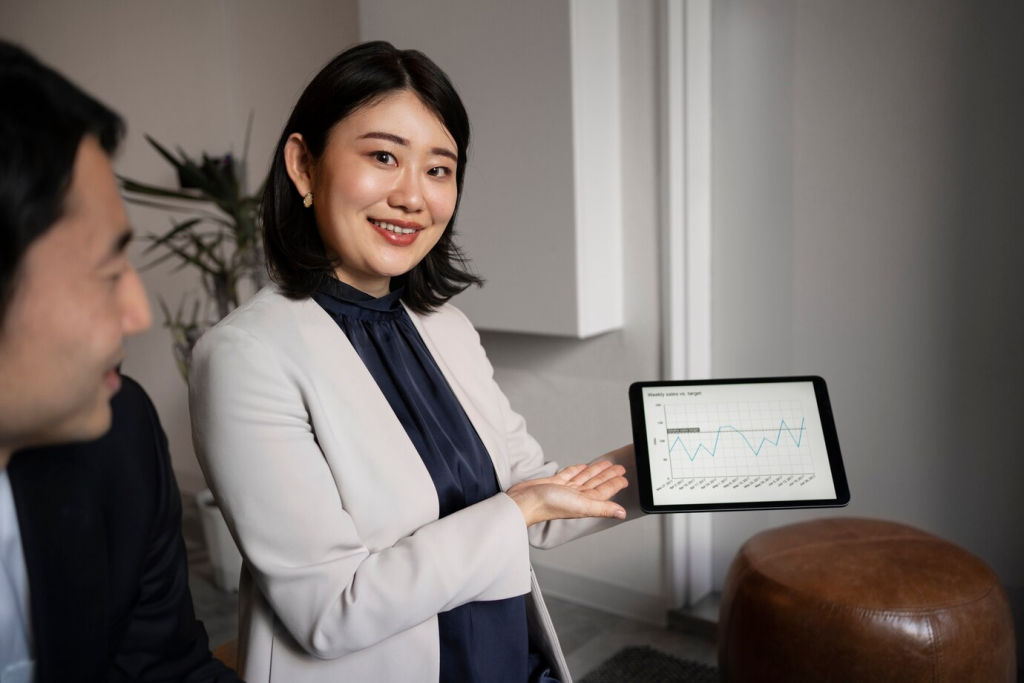 Woman using ecommerce erp for better analytics reporting.
