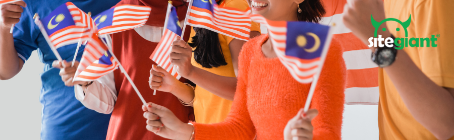 Malaysia people are waving Malaysia flag